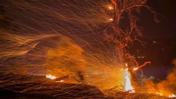 A strong wind blows embers during the Thomas Fire on December 16th, 2017, in Montecito, California.