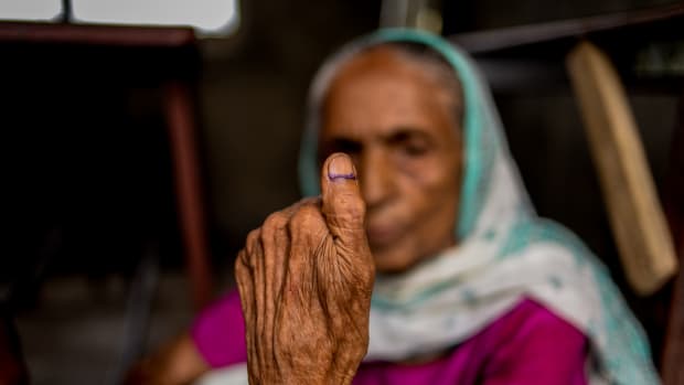 A Nepali woman shows her inked thumb after casting her ballot during the third phase of the Nepalese local elections at a polling station at Birgunj Parsa district, some 150 kilometers south of Kathmandu, on September 18th, 2017.