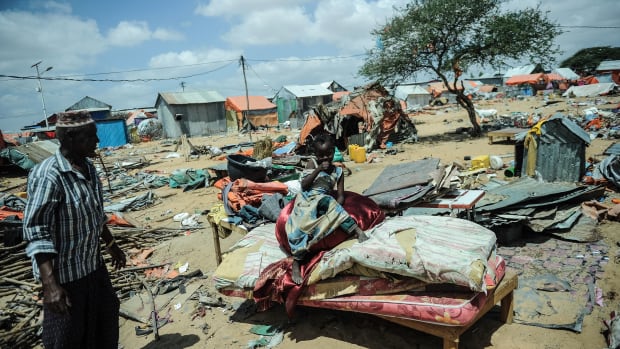 Somali internally displaced refugees prepare to leave their shelter with their possessions on January 17th, 2018, after the owner of the land ordered them to vacate his property in Mogadishu.