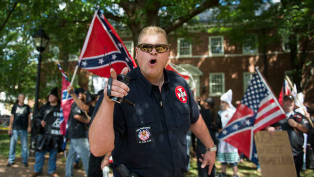 A member of the Ku Klux Klan shouts at counter-protesters during a rally in Charlottesville, Virginia, on July 8th, 2017.