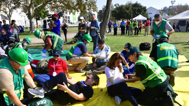 First responders tend to exercise victims, playing the role of earthquake casualties, during the 2017 Great California Shakeout earthquake drill at the Natural History Museum in Los Angeles, California, on October 19th, 2017.
