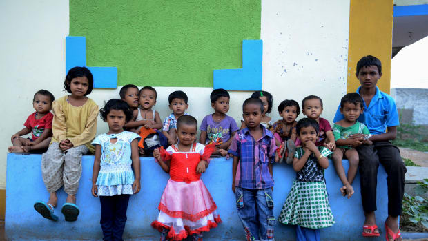 Rohingya Muslim children pose for a photo at a refugee camp in the old city of Hyderabad.