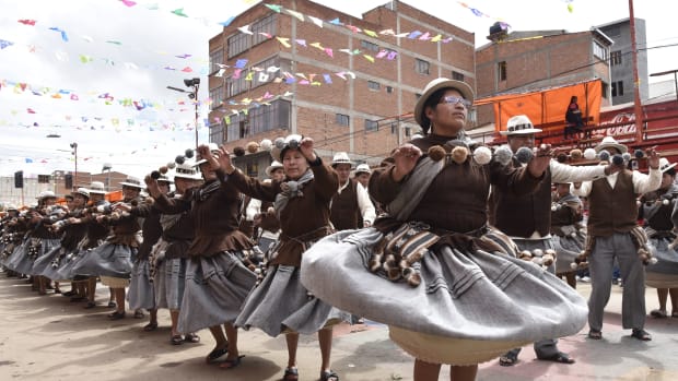 Aymara indigenous people perform traditional Andes highlands folk dances during the Anata Andino harvest festival in Oruro, Bolivia, on February 8th, 2018. During the harvest festival, native peasant farmers from different Bolivian highlands communities dance in the streets of Oruro giving thanks to Pachamama (Mother Earth) for the abundant crops.