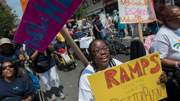 People participate in the first annual Disability Pride Parade on the 25th anniversary of the Americans With Disabilities Act on July 12th, 2015, in New York City.