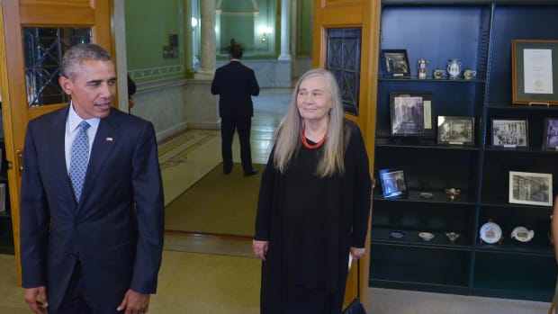 President Barack Obama and Marilynne Robinson arrive for a visit to the State Library of Iowa during an unannounced stop on September 14th, 2015, in Des Moines, Iowa.