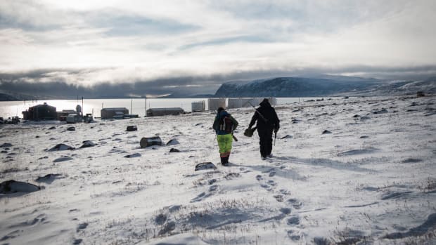 Markoosi and Nanasi Illauq walk to Clyde River's tiny harbor to set off for a day of hunting. For many Inuit, hunting represents a link to millennia of tradition—but those links are rapidly weakening in a changing climate.