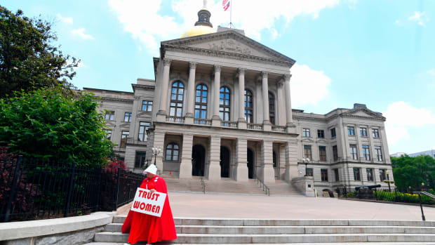 Activist Tamara Stevens with the Handmaids Coalition of Georgia leaves the Georgia Capitol after Democratic presidential candidate Senator Kirsten Gillibrand addressed an event to speak out against the recently passed "heartbeat" bill on May 16th, 2019, in Atlanta, Georgia.