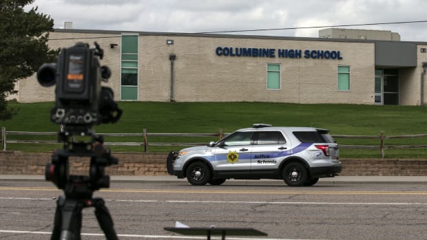 Police patrol outside Columbine High School on April 17th, 2019, in Littleton, Colorado, as all Denver-area schools were evacuated and classes canceled after an active threat to the area.