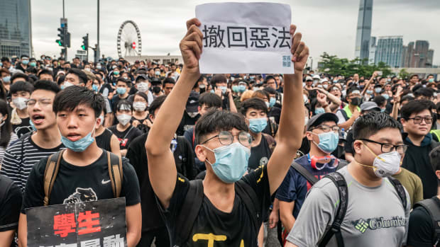 Protesters hold placards and shout slogans as they occupy a street demanding that Hong Kong Chief Executive Carrie Lam step down, after a rally against the now-suspended extradition bill outside of the chief executive office on June 17th, 2019, in Hong Kong, China. The controversial bill would allow Hong Kong citizens suspected of crimes to be extradited to mainland China.