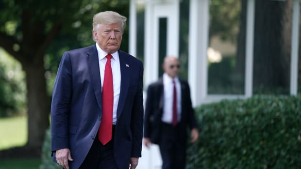 President Donald Trump walks to reporters before leaving the White House for the G20 summit on June 26th, 2019.