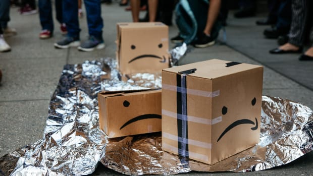 Protesters left boxes on the ground in front of an Amazon store on 34th Street on July 15, 2019, in New York City. The protest, raising awareness of Amazon facilitating ICE surveillance efforts, coincides with Amazon's Prime Day, when Amazon offers discounts to Prime members.