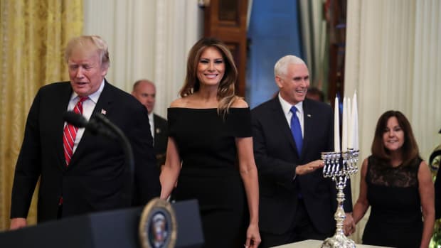 President Donald Trump, Melania Trump, Vice President Mike Pence, and Karen Pence attend a Hanukkah reception in the East Room of the White House on December 6th, 2018, in Washington, D.C.