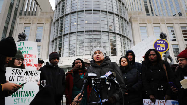 As a trial begins to try to protect Haitian immigrants under Temporary Protected Status from being deported back to Haiti, people demonstrate in front of the Eastern District of New York Federal Courthouse in downtown Brooklyn on January 7th, 2019, in New York City. President Donald Trump is trying to end TPS for Haitians. TPS allows immigrants to work and live in the United States following a natural disaster or an ongoing armed conflict in their home country. It was granted to Haitians following the 2010 7.0 magnitude earthquake that decimated the island nation and resulted in the death of 250,000 Haitians.
