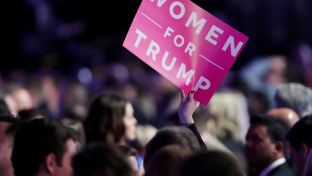 An attendee holds up a 'Women For Trump' sign during the election night event at the New York Hilton Midtown on November 8th, 2016, in New York City.