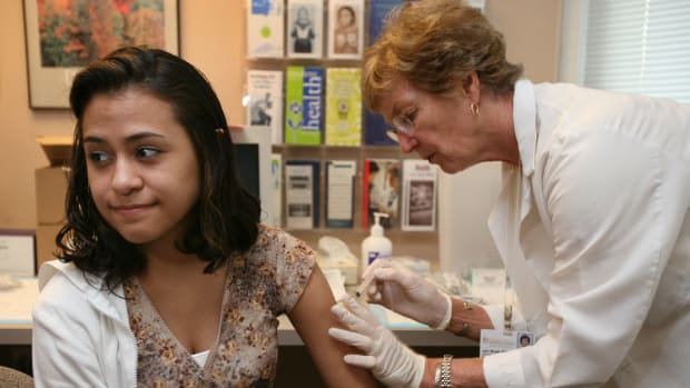 University of Iowa junior Erica Zamudil receives a mumps, measles, and rubella vaccination shot on April 27th, 2006, in Iowa City, Iowa.