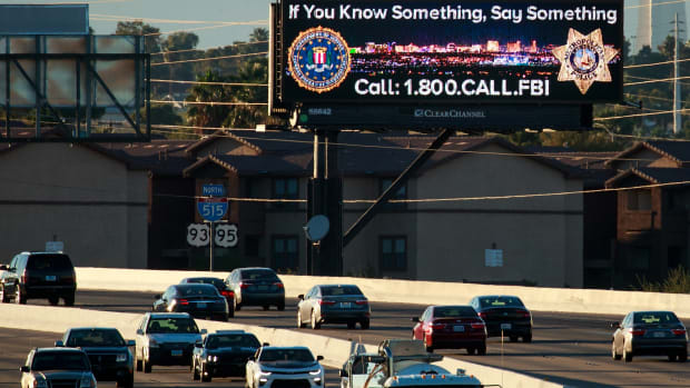 A roadside billboard featuring a FBI tip line phone number on Interstate 515, in Las Vegas, Nevada, in October of 2017.