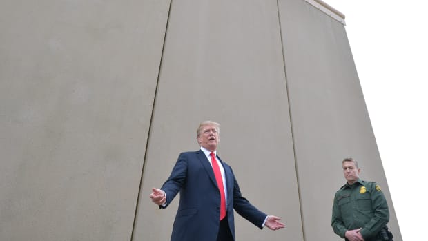 President Donald Trump inspects border wall prototypes with Chief Patrol Agent Rodney S. Scott in San Diego, California, on March 13th, 2018.