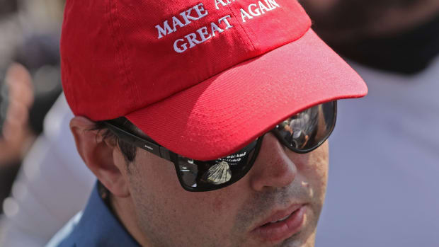A man wears a Make America Great Again hat during the Unite the Right rally on August 12th, 2017, in Charlottesville, Virginia.
