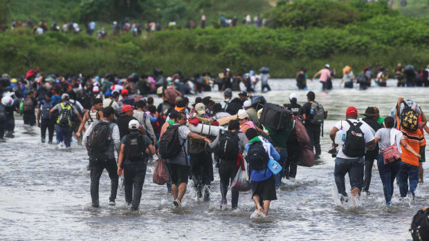 Salvadorean migrants heading in a caravan to the U.S. cross the Suchiate River to Mexico, as seen from Ciudad Tecun Uman, Guatemala, on November 2nd, 2018.
