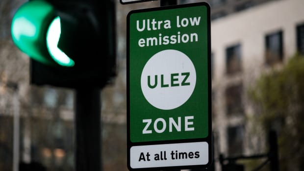 A green sign demarcates London's Ultra Low Emissions Zone as the charge comes into effect on April 8th, 2019, in London, England. In a bid by Transport for London to improve air quality, older and more polluting cars will be charged £12.50 to enter the ULEZ area and congestion zone.