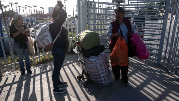 People walk back to Tijuana from San Diego at San Ysidro crossing port in Tijuana, Mexico, on April 2nd, 2019.