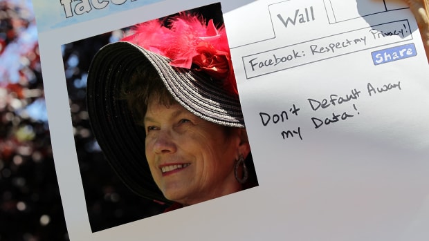 Denely Rafferty of the group Raging Grannies protests outside of Facebook headquarters in June of 2010.