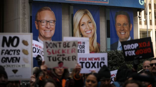 People protesting against Fox News outside the company's headquarters in New York City on March 13th, 2019. Fox News personalities Tucker Carlson and Jeanine Pirro have come under criticism in recent weeks for controversial comments and multiple advertisers have pulled away from their shows.