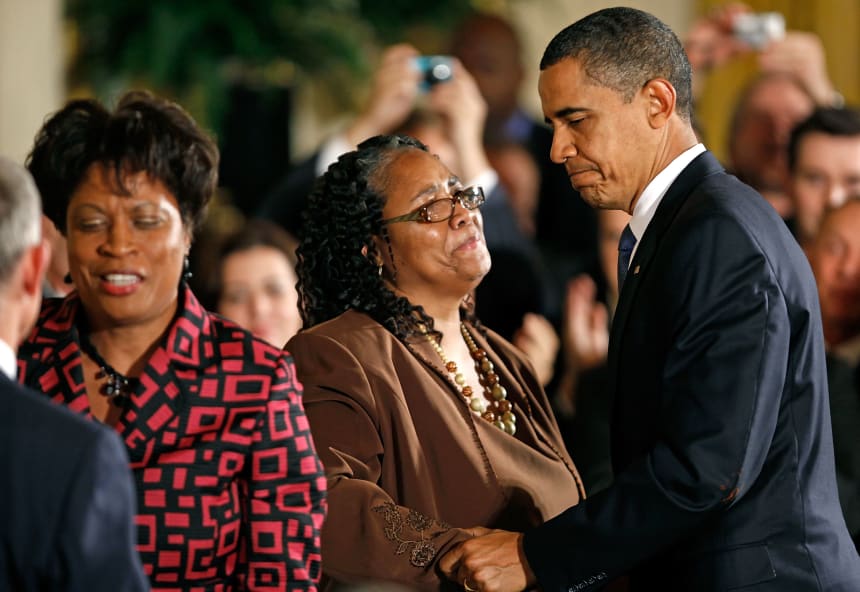 President Barack Obama greets Betty Byrd Boatner (right) and Louvon Harris, sisters of James Byrd Jr., following the enactment of the Matthew Shepard and James Byrd, Jr. Hate Crimes Prevention Act, on October 28th, 2009.