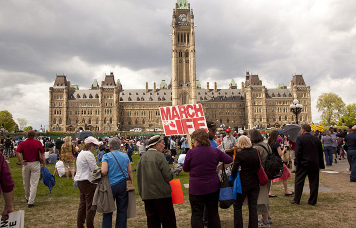 Pro-life and anti-abortion demonstrators protest in front of the Parliament buildings in Ottawa, Canada, on May 9, 2013. (Photo: njene/Shutterstock)