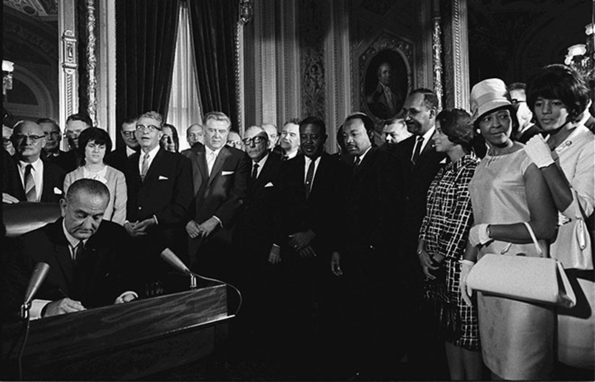 President Johnson signs the Voting Rights Act of 1965. (Photo: Public Domain)