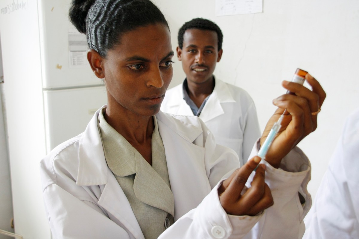 A nurse prepares a measles vaccine. (Photo: UK Department for International Development/Flickr)