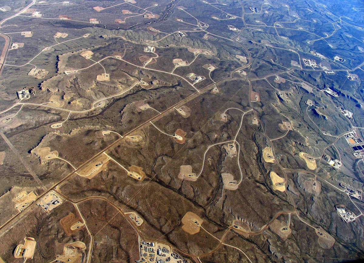 In areas where shale-drilling/hydraulic fracturing is heavy, a dense web of roads, pipelines, and well pads turn continuous forests and grasslands into fragmented islands. (Simon Fraser University/Flickr)