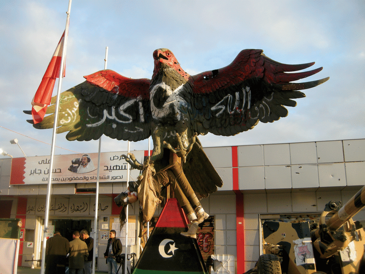 In the Wings: Extravagant art recovered from one of Muammar Gaddafi's houses graces the street of Misrata, Libya, during an uprising in 2011 that saw many thousands of civilians take up arms. (Photo: Harvey Whitehouse)