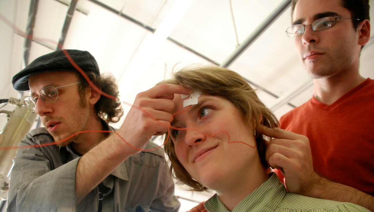 A woman with electrodes attached to her head. (Photo: Lisa Brewster/Flickr)
