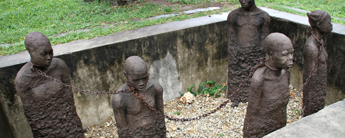 Statues at the Slavery Monument in Stone Town, Zanzibar, Tanzania. (Photo: BarryTuck/Shutterstock)