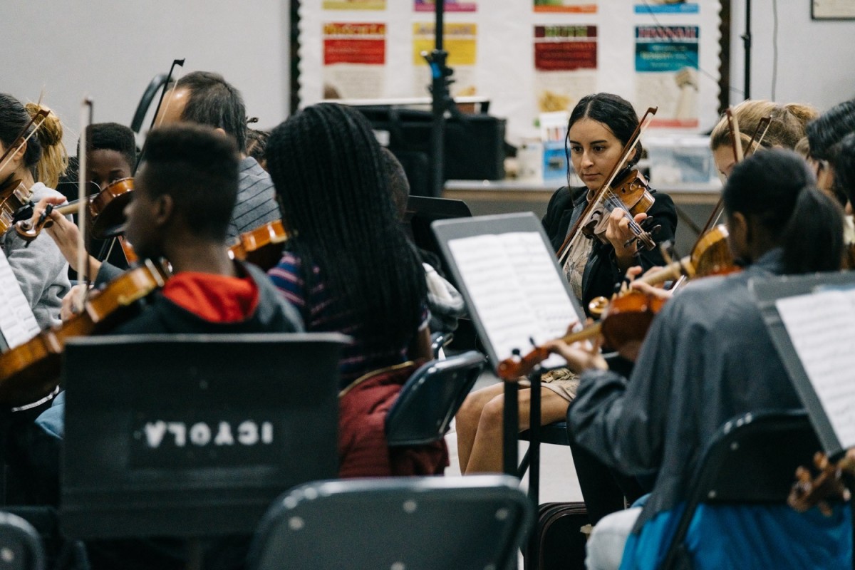Vianney Bernabé, 24, is a member of the Inner City Youth Orchestra of Los Angeles and assists other students during rehearsals.