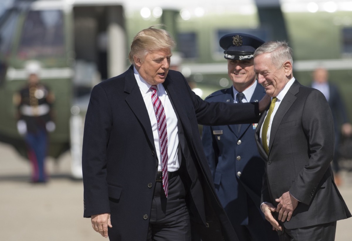 President Donald Trump greets Secretary of Defense James Mattis. (Photo: Saul Loeb/AFP/Getty Images)