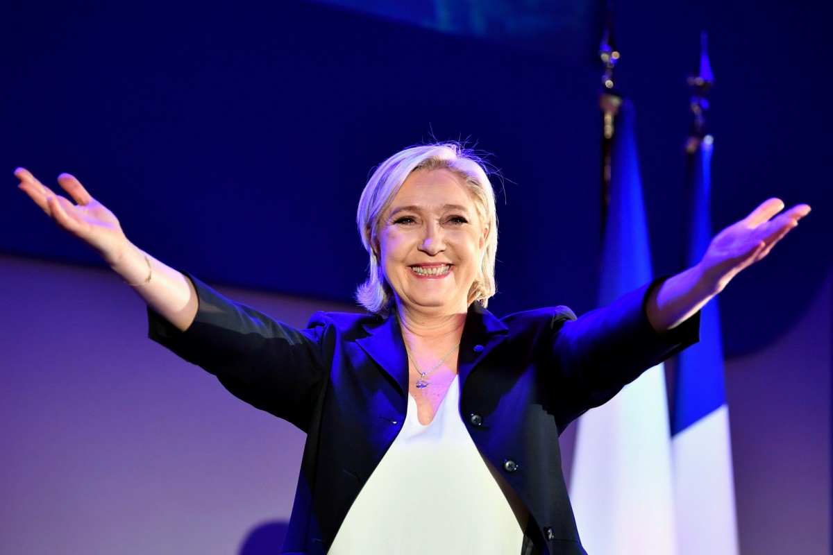 National Front leader Marine Le Pen addresses activists in Hénin-Beaumont, France, following her second-place finish in the opening round of the presidential elections on April 23rd, 2017. (Photo: Jeff J. Mitchell/Getty Images)