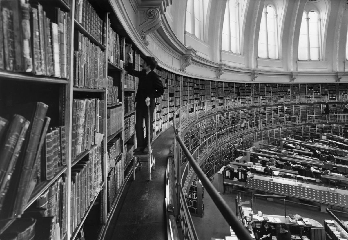 A black and white photograph of a library