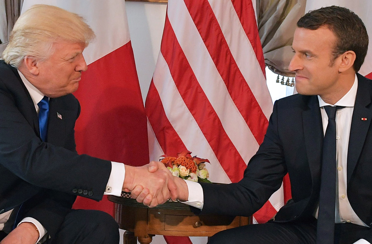 President Donald Trump and French President Emmanuel Macron shake hands ahead of a working lunch on the sidelines of the NATO summit in Brussels on May 25th, 2017.