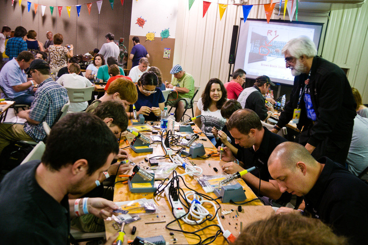 Newcomers attend a coding workshop at an Orlando maker faire.