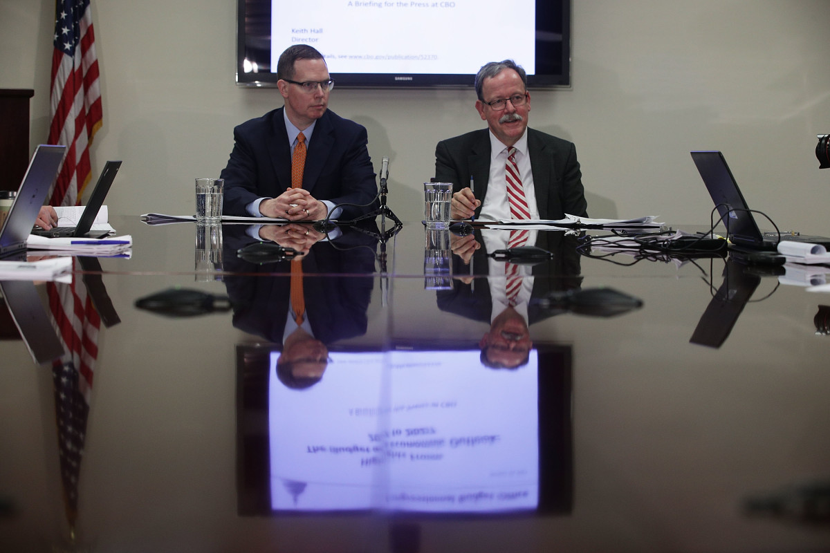 Congressional Budget Office Director Keith Hall (right) and CBO Deputy Director Mark Hadley participate in a media briefing on January 24th, 2017, in Washington, D.C.