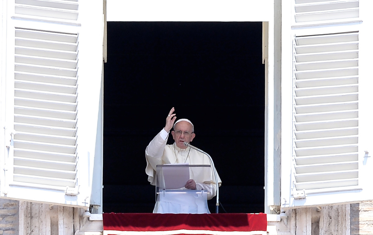 Pope Francis blesses the crowd attending the Angelus prayer in St. Peter's Square at the Vatican on July 23rd, 2017.