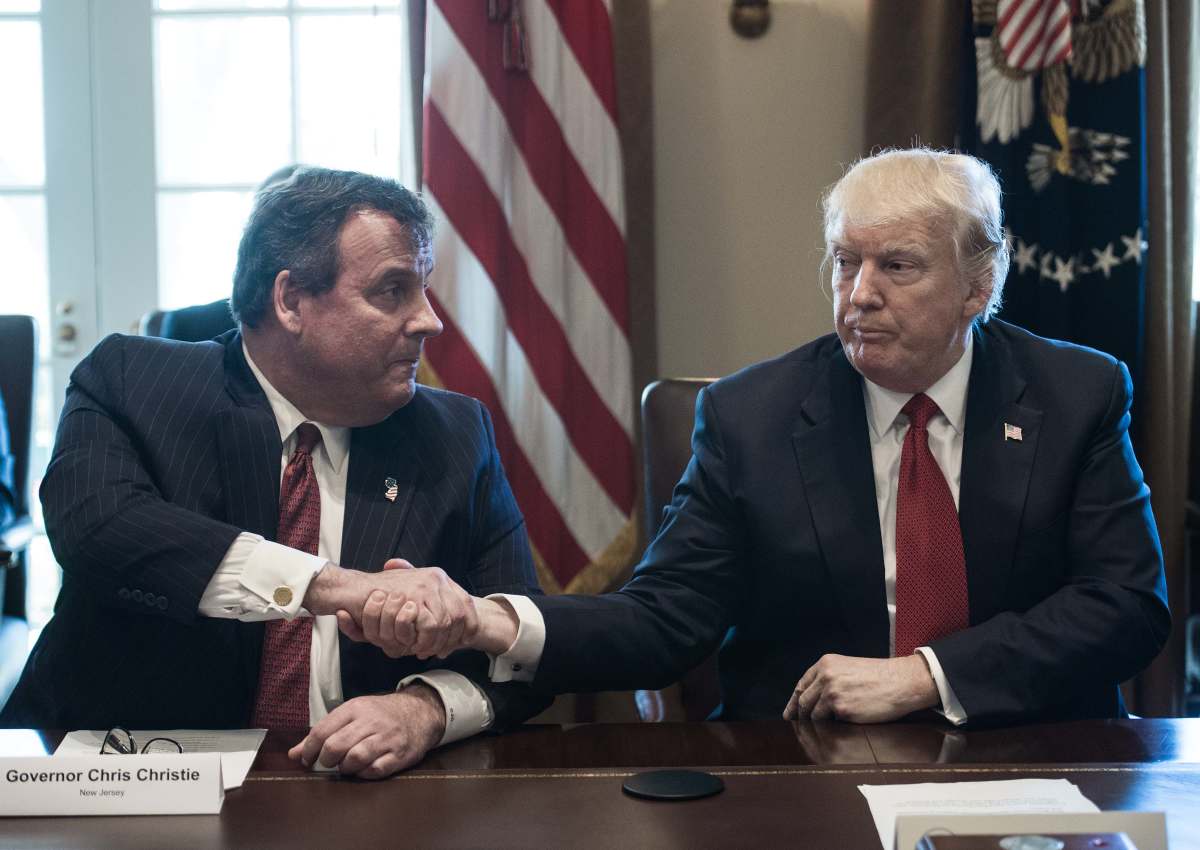 President Donald Trump shakes hands with New Jersey Governor Chris Christie during a meeting about opioid and drug abuse on March 29th, 2017.