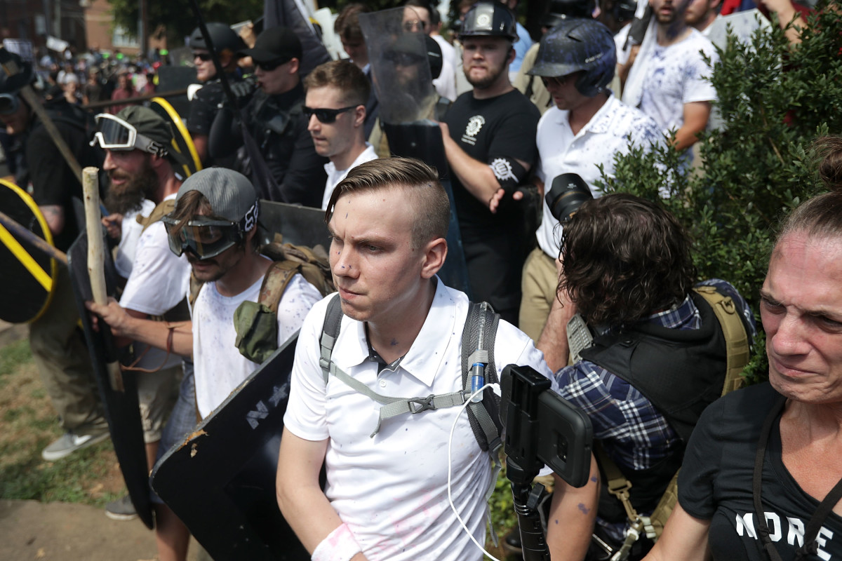 White nationalists, neo-Nazis, and members of the alt-right exchange insults with counter-protesters during the Unite the Right rally on August 12th, 2017, in Charlottesville, Virginia.