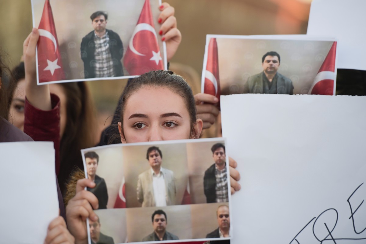 Students of Mehmet Akif College hold pictures of their Turkish teachers as they demonstrate against their arrest in Pristina on March 29th, 2018. In an operation carried out between Turkey's National Intelligence Organization and Kosovo's spy services, six high-ranking members of U.S.-based Muslim cleric Fethullah Gulen's movement were brought back home on a private plane, Anadolu news agency reported, citing security sources.