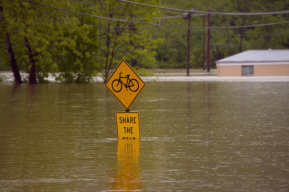 Floodwater covers a street sign on May 4th, 2017, in Fenton, Missouri.