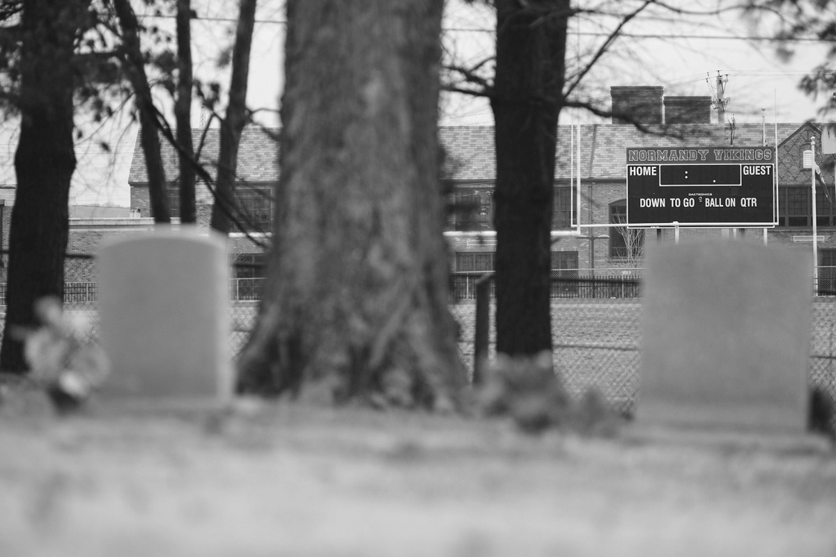 Michael Brown is buried in the cemetery that overlooks his old high school.