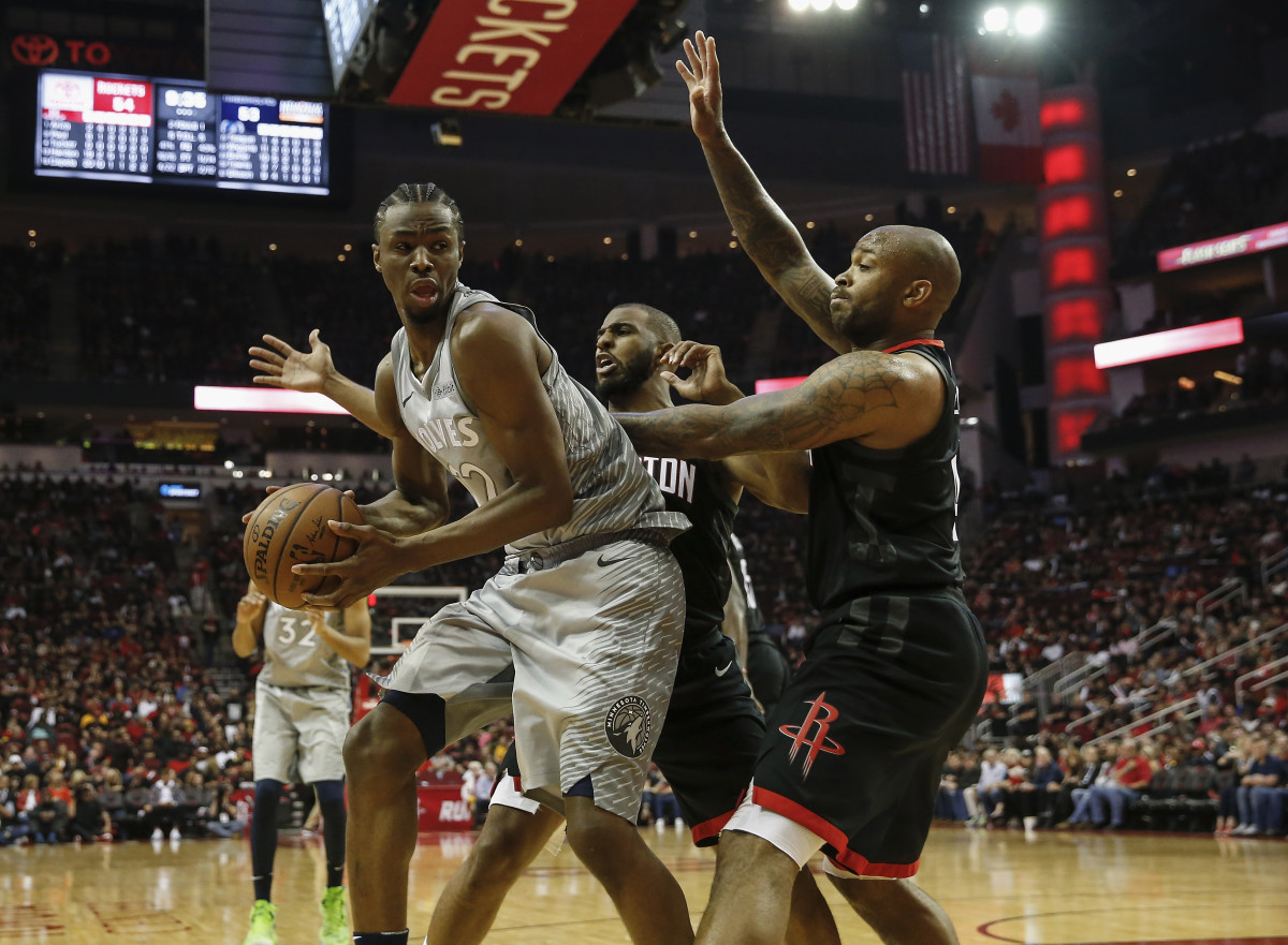 Andrew Wiggins of the Minnesota Timberwolves (left) during game one of the first round of the 2018 NBA Playoffs in Houston, Texas, on April 15th, 2018.