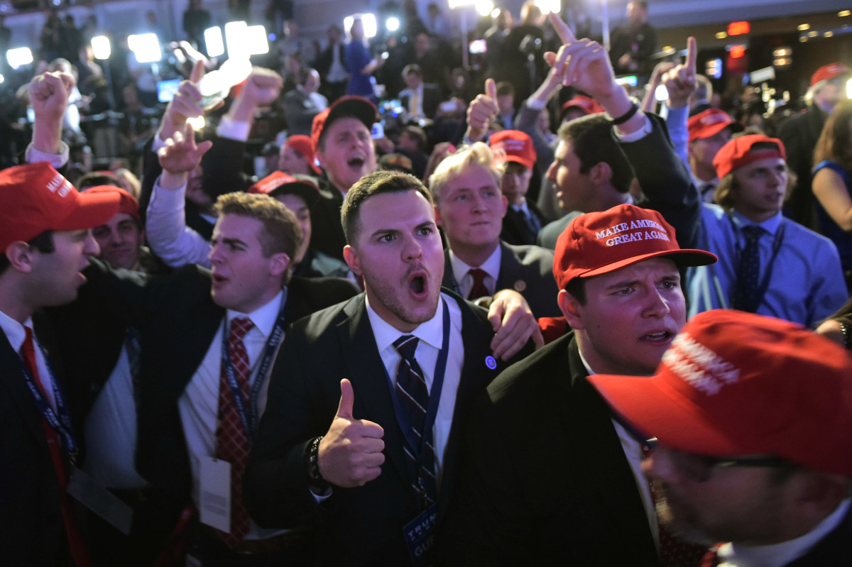 Trump supporters react to results during election night in New York City on November 8th, 2016.